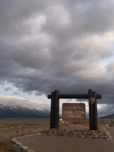 Entrance sign to grand teton national park at sunrise